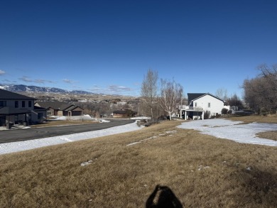 Set in a picturesque location, this lot offers elevated views of on The Powder Horn Golf Club - Mountain in Wyoming - for sale on GolfHomes.com, golf home, golf lot