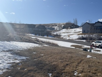 Set in a picturesque location, this lot offers elevated views of on The Powder Horn Golf Club - Mountain in Wyoming - for sale on GolfHomes.com, golf home, golf lot