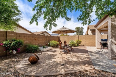 This charming home is so lovely and updated in all the right on Poston Butte Golf Club in Arizona - for sale on GolfHomes.com, golf home, golf lot