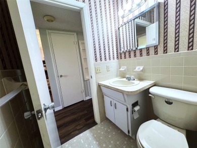 Nestled within the serene enclave of the On Top of the World on On Top Of The World Golf Course in Florida - for sale on GolfHomes.com, golf home, golf lot