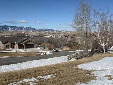 Set in a picturesque location, this lot offers elevated views of on The Powder Horn Golf Club - Mountain in Wyoming - for sale on GolfHomes.com, golf home, golf lot