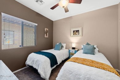 This charming home is so lovely and updated in all the right on Poston Butte Golf Club in Arizona - for sale on GolfHomes.com, golf home, golf lot