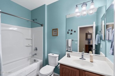 This charming home is so lovely and updated in all the right on Poston Butte Golf Club in Arizona - for sale on GolfHomes.com, golf home, golf lot