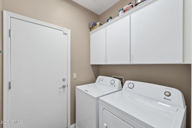 This charming home is so lovely and updated in all the right on Poston Butte Golf Club in Arizona - for sale on GolfHomes.com, golf home, golf lot