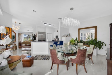 Rarely available single-story courtyard home perfectly situated on  in Florida - for sale on GolfHomes.com, golf home, golf lot