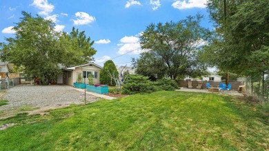 This Jewel of a home is ready to be yours! Artfully painted and on Lincoln Park Golf Course in Colorado - for sale on GolfHomes.com, golf home, golf lot