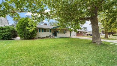 This Jewel of a home is ready to be yours! Artfully painted and on Lincoln Park Golf Course in Colorado - for sale on GolfHomes.com, golf home, golf lot