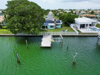 TOP WATERFRONT LOCATION ON AN OVERSIZED 100' WATERFRONT LOT WITH on Treasure Bay Golf and Tennis in Florida - for sale on GolfHomes.com, golf home, golf lot