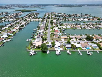 TOP WATERFRONT LOCATION ON AN OVERSIZED 100' WATERFRONT LOT WITH on Treasure Bay Golf and Tennis in Florida - for sale on GolfHomes.com, golf home, golf lot