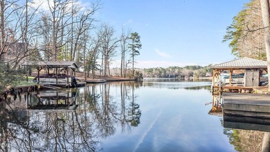 Build your dream waterfront home in the gated, resort-style on River Golf and Country Club at Lake Royale in North Carolina - for sale on GolfHomes.com, golf home, golf lot