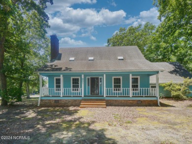 Discover your coastal retreat at 801 Elizabeth Drive, nestled in on Oak Island Golf Club in North Carolina - for sale on GolfHomes.com, golf home, golf lot