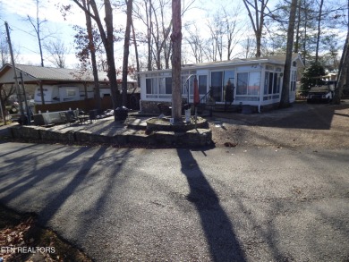 Enjoy the lake life  living in this 1bed/1bath park model  RV on Lake Tansi Village Country Club in Tennessee - for sale on GolfHomes.com, golf home, golf lot