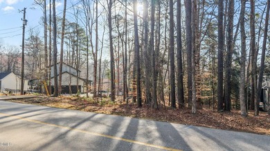 Build your dream waterfront home in the gated, resort-style on River Golf and Country Club at Lake Royale in North Carolina - for sale on GolfHomes.com, golf home, golf lot