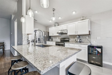 Beautifully renovated, gated, GOLF course views on Lexington Oaks Golf Club in Florida - for sale on GolfHomes.com, golf home, golf lot