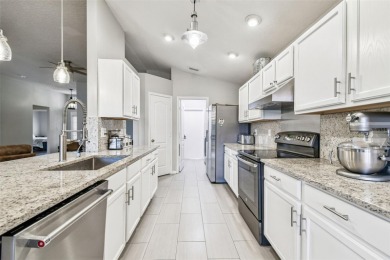 Beautifully renovated, gated, GOLF course views on Lexington Oaks Golf Club in Florida - for sale on GolfHomes.com, golf home, golf lot