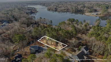 Build your dream waterfront home in the gated, resort-style on River Golf and Country Club at Lake Royale in North Carolina - for sale on GolfHomes.com, golf home, golf lot