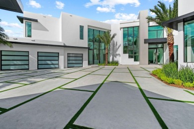 Welcome to a modern masterpiece in the prestigious Admirals Cove on Jonathans Landing Golf Club in Florida - for sale on GolfHomes.com, golf home, golf lot