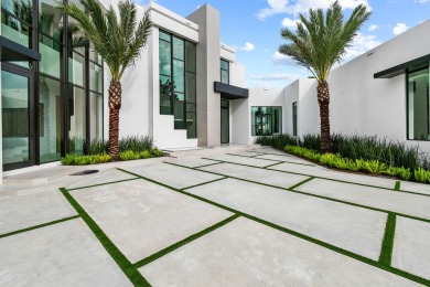 Welcome to a modern masterpiece in the prestigious Admirals Cove on Jonathans Landing Golf Club in Florida - for sale on GolfHomes.com, golf home, golf lot