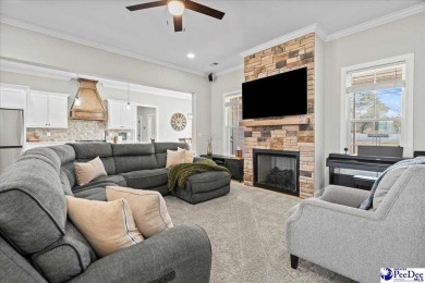 What a beautiful home! The stone entry way brings warmth and on Hartsville Country Club in South Carolina - for sale on GolfHomes.com, golf home, golf lot