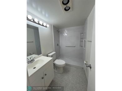 BEAUTIFULLY REMODELED 1ST FLOOR 1BEDROOM/1BATH CONDO, PERMITTED on Hillsboro Pines Golf in Florida - for sale on GolfHomes.com, golf home, golf lot