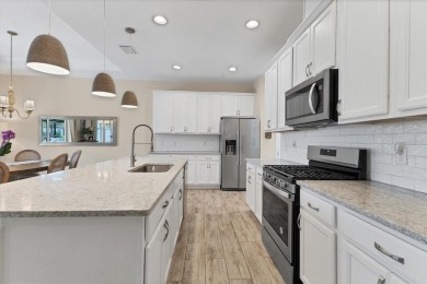 Situated on a generous corner lot within the gated Rosedale Golf on Rosedale Golf and Tennis Club in Florida - for sale on GolfHomes.com, golf home, golf lot