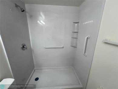 BEAUTIFULLY REMODELED 1ST FLOOR 1BEDROOM/1BATH CONDO, PERMITTED on Hillsboro Pines Golf in Florida - for sale on GolfHomes.com, golf home, golf lot