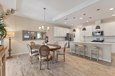 Situated on a generous corner lot within the gated Rosedale Golf on Rosedale Golf and Tennis Club in Florida - for sale on GolfHomes.com, golf home, golf lot