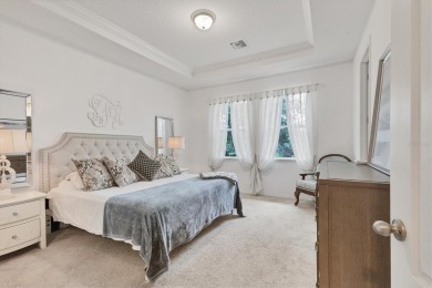 Situated on a generous corner lot within the gated Rosedale Golf on Rosedale Golf and Tennis Club in Florida - for sale on GolfHomes.com, golf home, golf lot