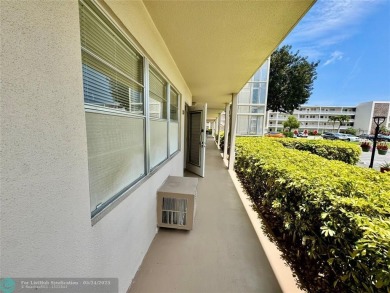 BEAUTIFULLY REMODELED 1ST FLOOR 1BEDROOM/1BATH CONDO, PERMITTED on Hillsboro Pines Golf in Florida - for sale on GolfHomes.com, golf home, golf lot