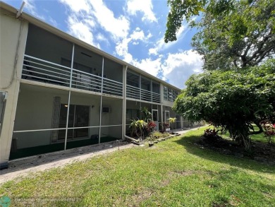 BEAUTIFULLY REMODELED 1ST FLOOR 1BEDROOM/1BATH CONDO, PERMITTED on Hillsboro Pines Golf in Florida - for sale on GolfHomes.com, golf home, golf lot