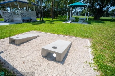 BEAUTIFULLY REMODELED 1ST FLOOR 1BEDROOM/1BATH CONDO, PERMITTED on Hillsboro Pines Golf in Florida - for sale on GolfHomes.com, golf home, golf lot