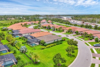 Situated on a generous corner lot within the gated Rosedale Golf on Rosedale Golf and Tennis Club in Florida - for sale on GolfHomes.com, golf home, golf lot