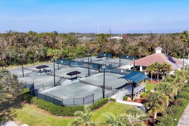 Situated on a generous corner lot within the gated Rosedale Golf on Rosedale Golf and Tennis Club in Florida - for sale on GolfHomes.com, golf home, golf lot