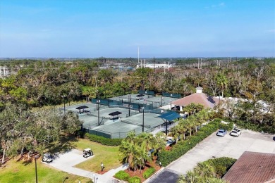 Situated on a generous corner lot within the gated Rosedale Golf on Rosedale Golf and Tennis Club in Florida - for sale on GolfHomes.com, golf home, golf lot