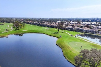 Situated on a generous corner lot within the gated Rosedale Golf on Rosedale Golf and Tennis Club in Florida - for sale on GolfHomes.com, golf home, golf lot