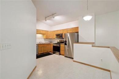 Great Townhome has good size front entry with closet and access on The Ponds Golf Club in Minnesota - for sale on GolfHomes.com, golf home, golf lot
