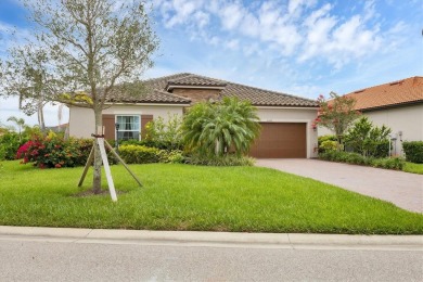 Situated on a generous corner lot within the gated Rosedale Golf on Rosedale Golf and Tennis Club in Florida - for sale on GolfHomes.com, golf home, golf lot