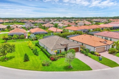 Situated on a generous corner lot within the gated Rosedale Golf on Rosedale Golf and Tennis Club in Florida - for sale on GolfHomes.com, golf home, golf lot