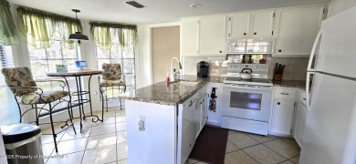 NEW ROOF AND AC INCLUDED with this charming 2 bedrooms 2 on Timber Pines Golf Course in Florida - for sale on GolfHomes.com, golf home, golf lot