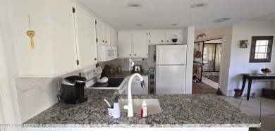 NEW ROOF AND AC INCLUDED with this charming 2 bedrooms 2 on Timber Pines Golf Course in Florida - for sale on GolfHomes.com, golf home, golf lot