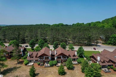 Condo at Crystal Mountain Resort! Golf in the summer, ski in the on Crystal Mountain Golf Course in Michigan - for sale on GolfHomes.com, golf home, golf lot