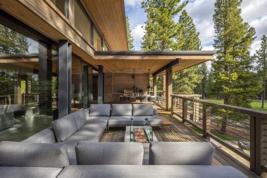 As you cross a bridge leading to the entry of this Walton on Lahontan Golf Club - Lahontan in California - for sale on GolfHomes.com, golf home, golf lot