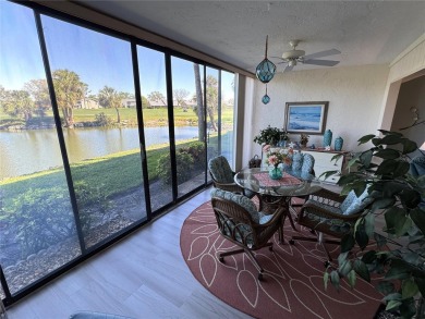 Starting from the colorfully landscaped front entrance to the on IMG Academies Golf and Country Club in Florida - for sale on GolfHomes.com, golf home, golf lot