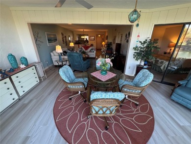 Starting from the colorfully landscaped front entrance to the on IMG Academies Golf and Country Club in Florida - for sale on GolfHomes.com, golf home, golf lot