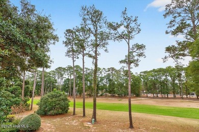Top-floor condo in Colony 1 golf community is move-in ready! on Oyster Bay Golf Links in North Carolina - for sale on GolfHomes.com, golf home, golf lot