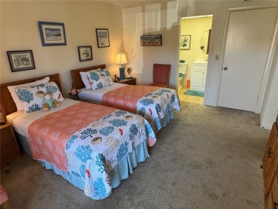 Starting from the colorfully landscaped front entrance to the on IMG Academies Golf and Country Club in Florida - for sale on GolfHomes.com, golf home, golf lot