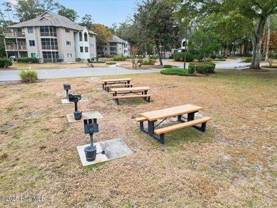 Top-floor condo in Colony 1 golf community is move-in ready! on Oyster Bay Golf Links in North Carolina - for sale on GolfHomes.com, golf home, golf lot