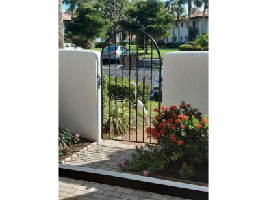 Starting from the colorfully landscaped front entrance to the on IMG Academies Golf and Country Club in Florida - for sale on GolfHomes.com, golf home, golf lot
