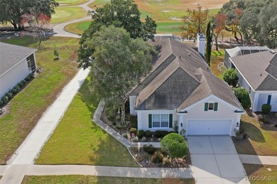 Beautiful 3-bedroom, 2-bath pool home with a 2-car garage on Southern Woods Golf Club in Florida - for sale on GolfHomes.com, golf home, golf lot