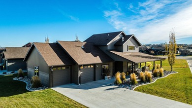 Beautifully upgraded and move-in ready, this two-level paired on The Powder Horn Golf Club - Mountain in Wyoming - for sale on GolfHomes.com, golf home, golf lot